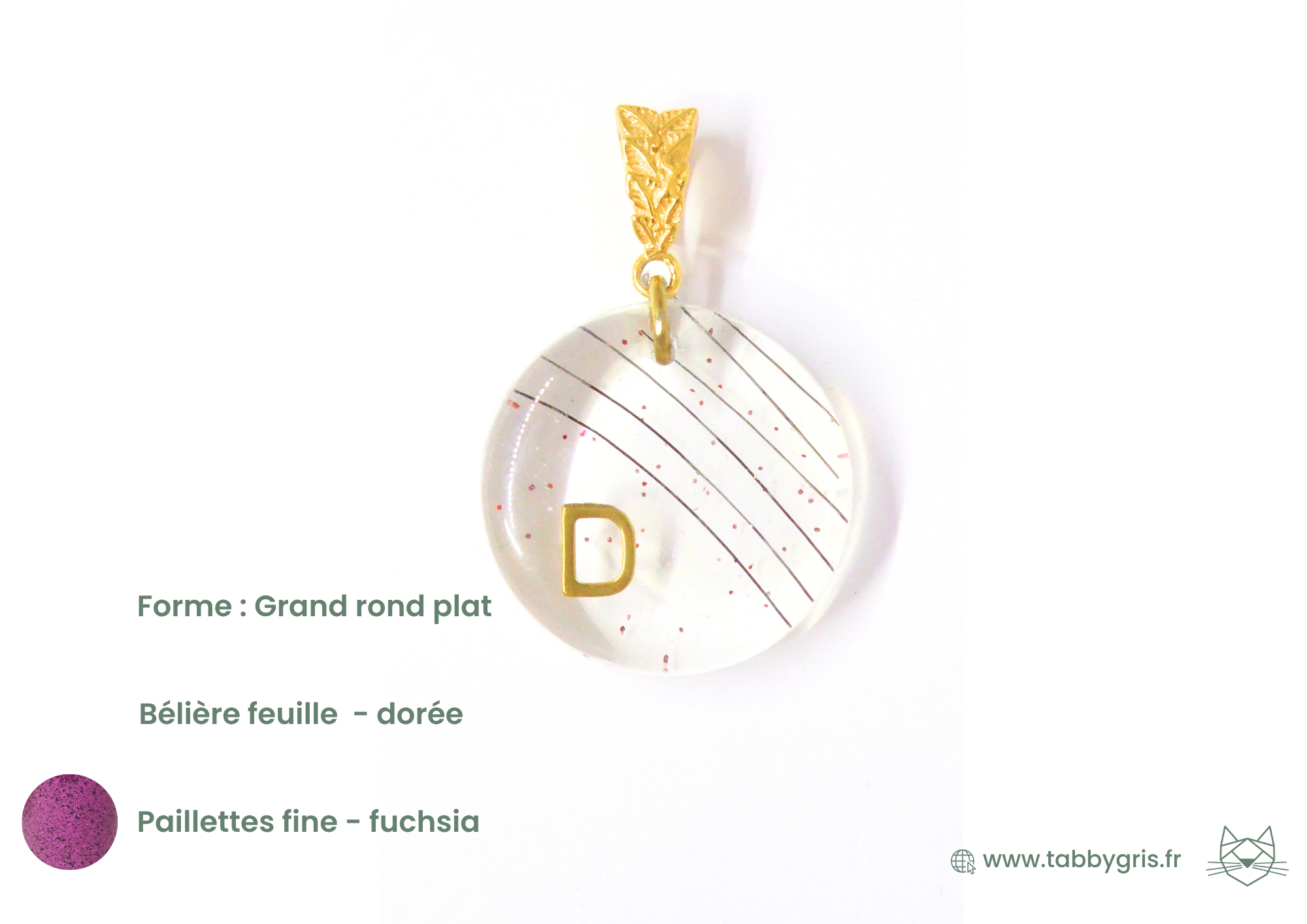 Pendentif poil animal. Ici les crins d'un cheval avec l'initiale D dans une forme de bijou en crins ronde et plate avec un soupçon de paillettes fines fuchsia.