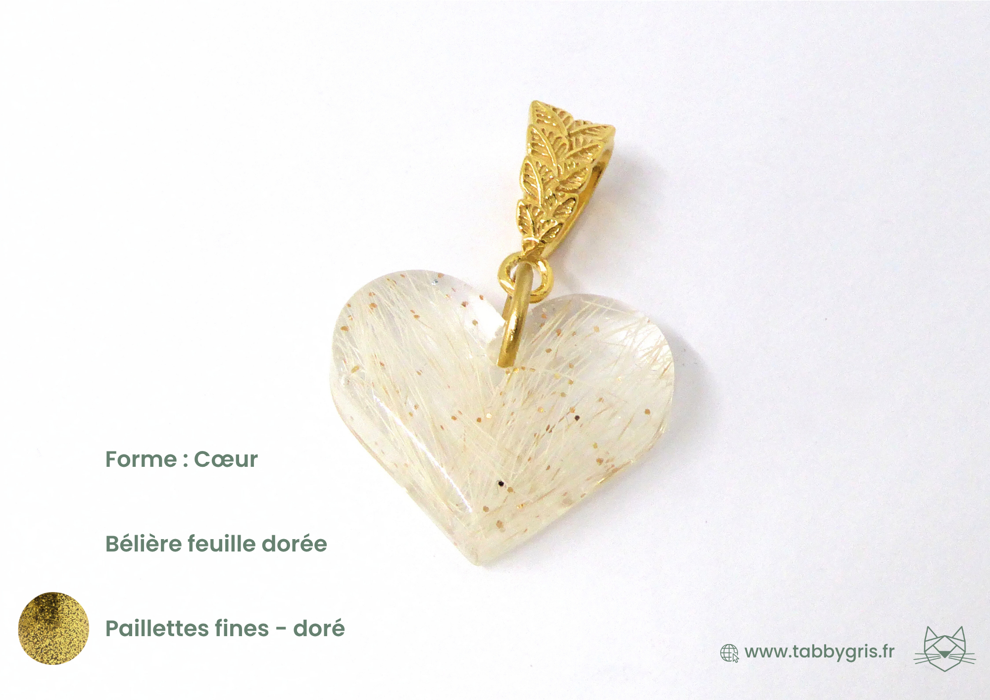 Pendentif poil animal d'un lapin blanc. Nous y avons ajouté des paillettes fines dorées et ajouté une bélière feuille dorée pour créer un bijou unique et personnalisé dont vous choisissez tous les composants.