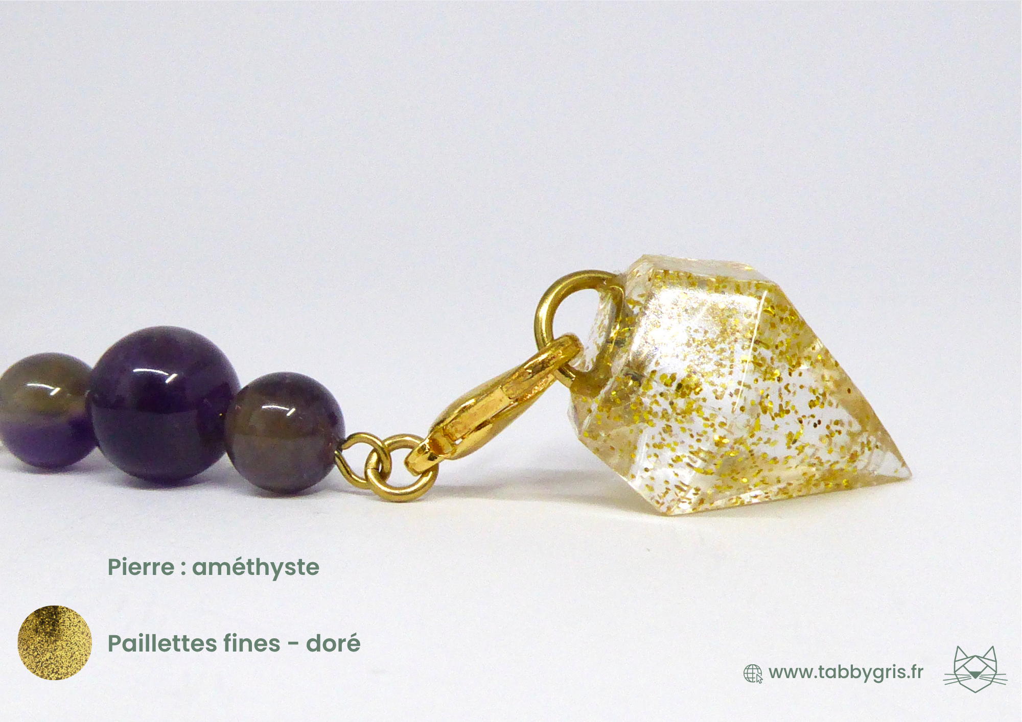 Pendule divinatoire en pierre naturelle avec une pierre améthyste et des pailletts fines dorées