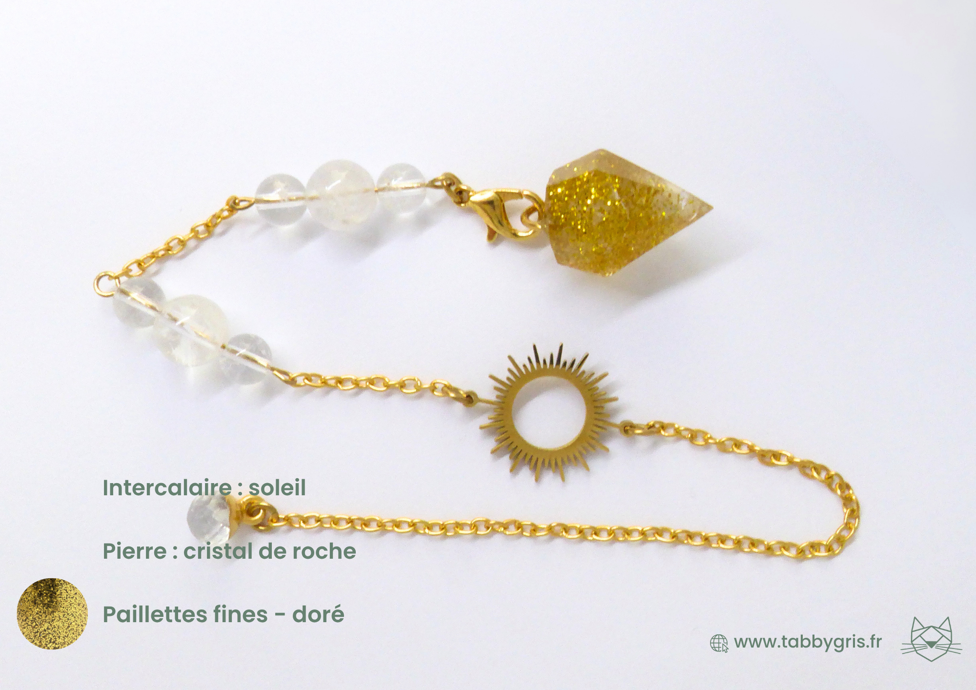 Pendule divinatoire en pierre naturelle incluant un intercalaire soleil doré, un cristal de roche chargé et quelques paillettes fines dorées dans la résine de dernière génération