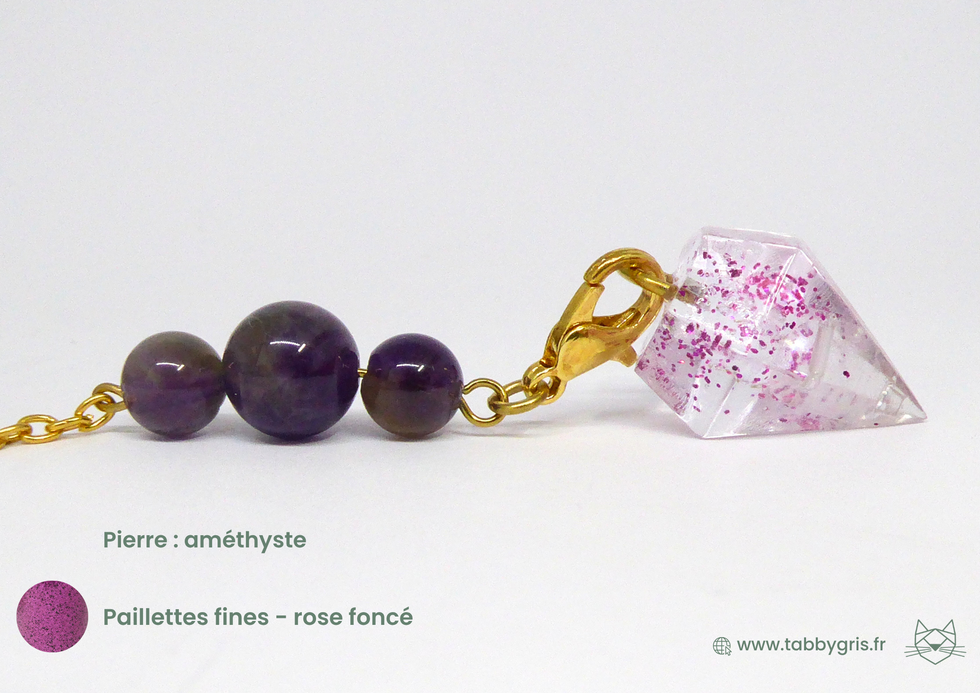 Pendule divinatoire en pierre naturelle incluant une pierre améthyste et des paillettes fines rose foncé